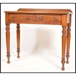 A Victorian mahogany writing table desk raised on good turned legs with ball feet, single frieze