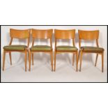 A set of 4 mid century Ben Chairs ( benchairs ) raised on angular bentwood frames with green