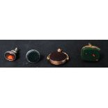 A group of vintage 20th century intaglio fob pendants to include a hallmarked 9ct gold example