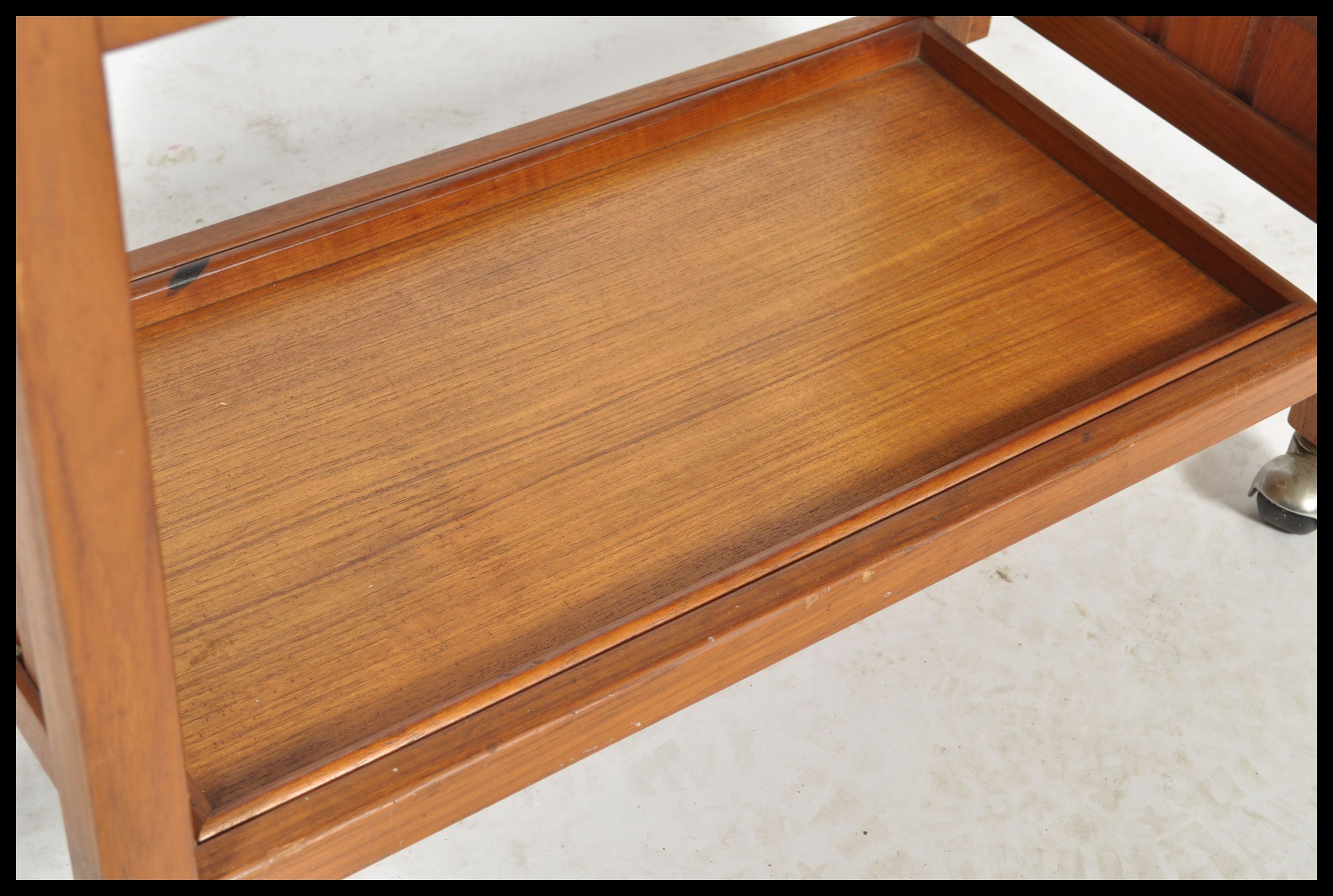 A vintage mid 20th century retro danish influence teak trolley with sliding removable trays raised - Image 5 of 5