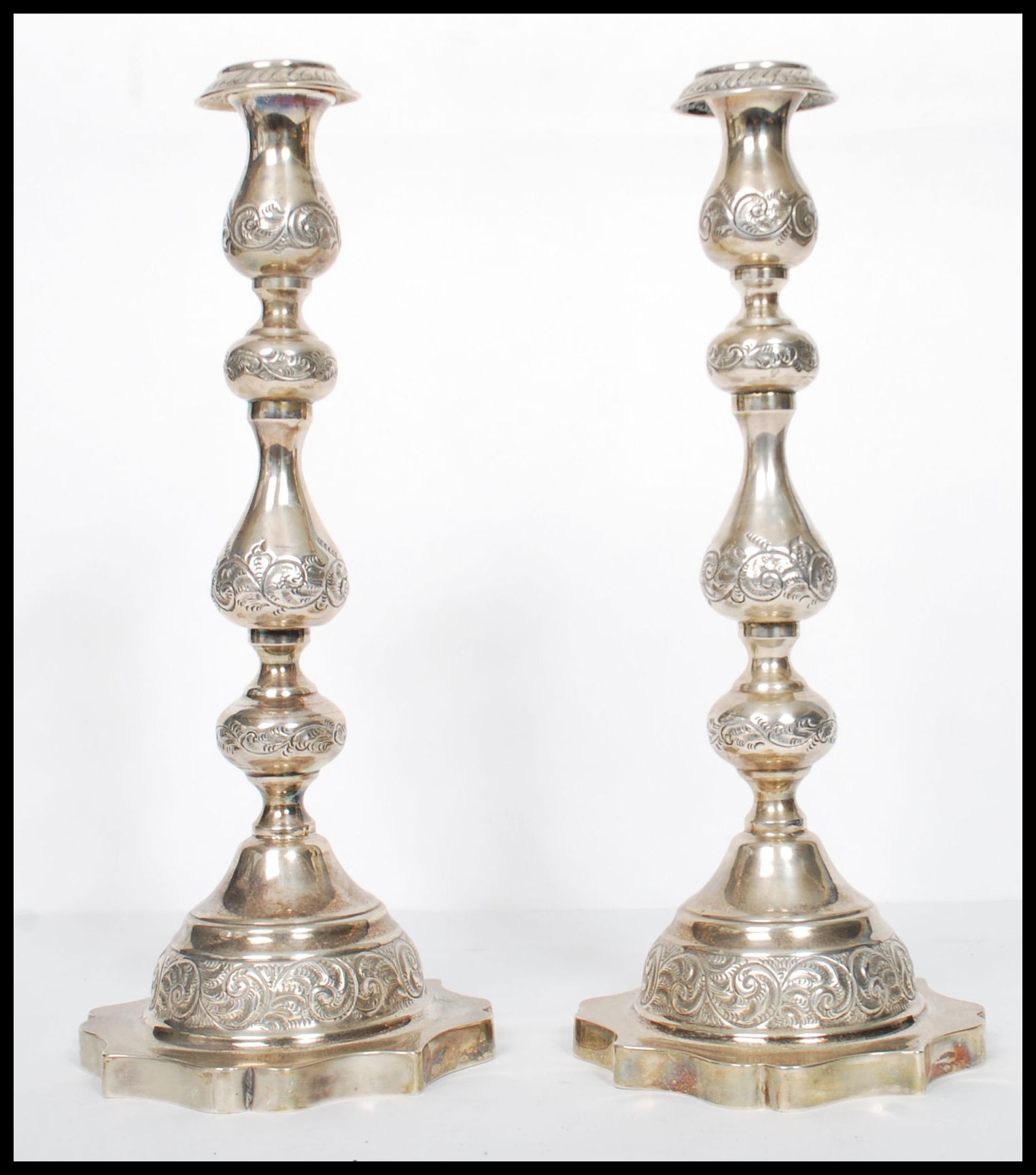 A large pair of Edwardian silver hallmarked London tall candlesticks with shaped terraces and shaped - Image 3 of 7