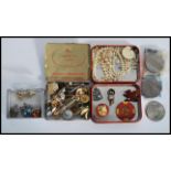 A group of vintage costume and dress jewellery to include gentleman's tie pins cuffs buttons