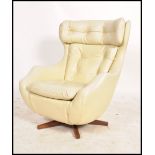 A vintage retro 20th century 1960's Parker Knoll large batwing swivel egg chair - armchair being