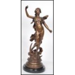 A French bronze figure - sculpture depicting a maiden seated on a crescent moon with cloud after