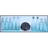 A collection of good clean coloured blue glass ( light ) lemonade bottles with the marbles intact