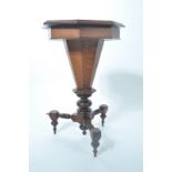 A 19th century Victorian oak trumpet shaped work box - games table.
