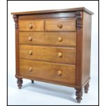 A Victorian mahogany Scottish chest of drawers being raised on turned legs with short and deep