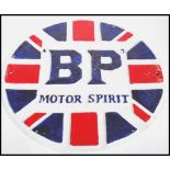 A vintage style cast metal point of sale advertising wall plaque for BP / British Petroleum. The