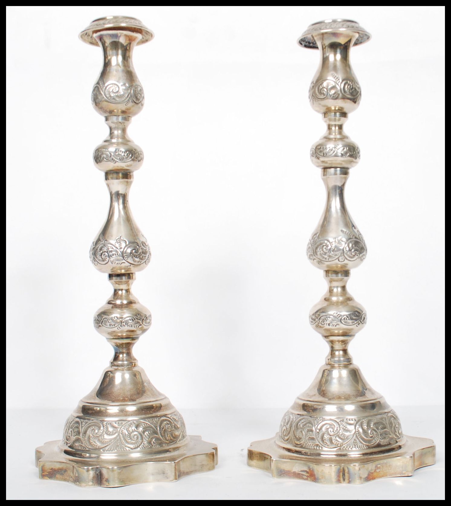 A large pair of Edwardian silver hallmarked London tall candlesticks with shaped terraces and shaped - Image 4 of 7