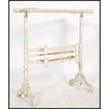A Victorian painted pine shabby chic towel rail. The towel rail of turned construction having