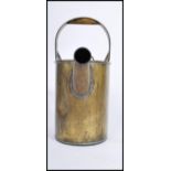 An early 20th century large copper Barge Ware hot water carrier / can, swing carry handle atop