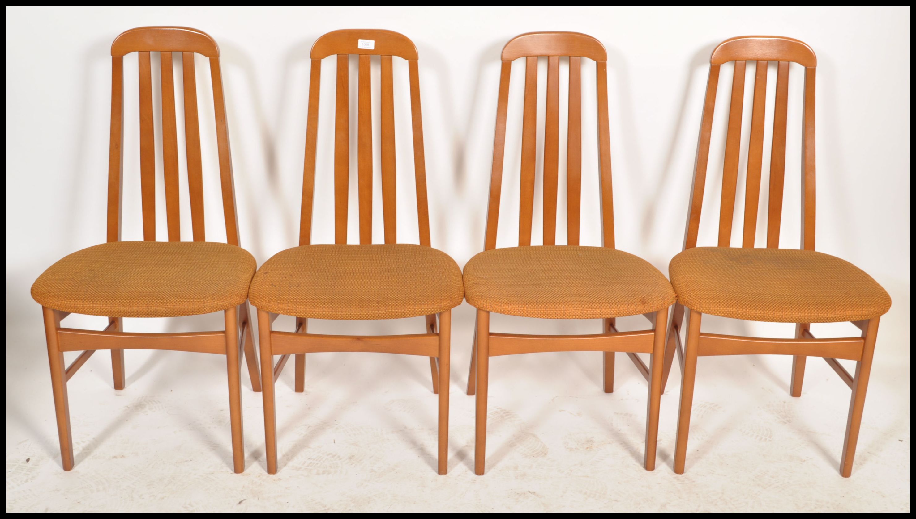A set of 4 20th century Nathan furniture dining chairs in teak being raised on tapering legs with - Image 2 of 4