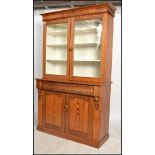 A good Victorian pitch pine and mahogany country dresser - cabinet. The base raised on plinth base