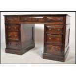 A good antique style - Georgian revival oak and leather twin pedestal office desk. Each pedestal