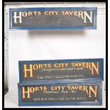 A set of 3 large 20th century external painted wooden advertising signs for Horts City Tavern Pub.