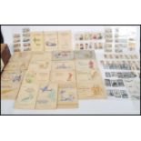 A collection of vintage 20th century cigarette cards to include Anstie Downland horse racing