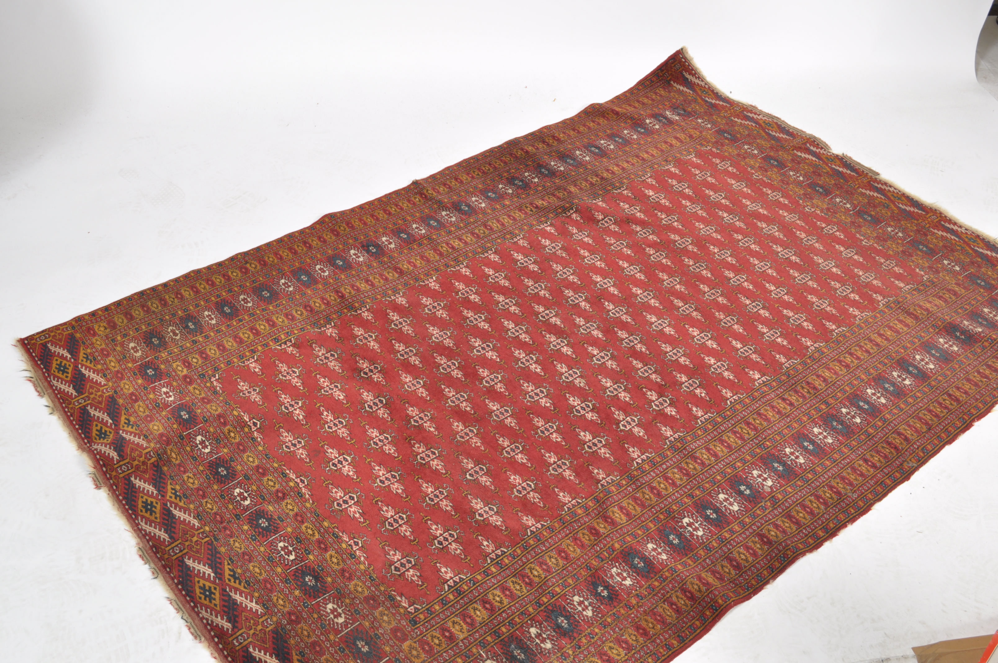 A vintage Uzbeki carpet rug being originally suppl
