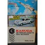 A group of three vintage boxed radios to include a Kasuga KC-201 an Solid State rocket radio, and