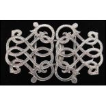 A pair of silver hallmarked scroll work Nurses buckles, Birmingham assay mark, date letter K (