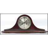 An Edwardian mahogany inlaid napoleons hat mantel