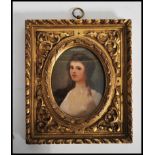 Henry Woods, RA (British, 1846-1921), A 19th century miniature oil painting of a young lady in a
