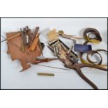 A group of antique leather working tool dating from the 19th century to include hole punch,