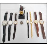 A collection of ladies and gents vintage 20th century watches to include watches by Curtiss,