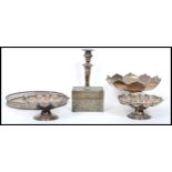 A collection of silver plated wares to include an Arts & Crafts hammered trinket box of