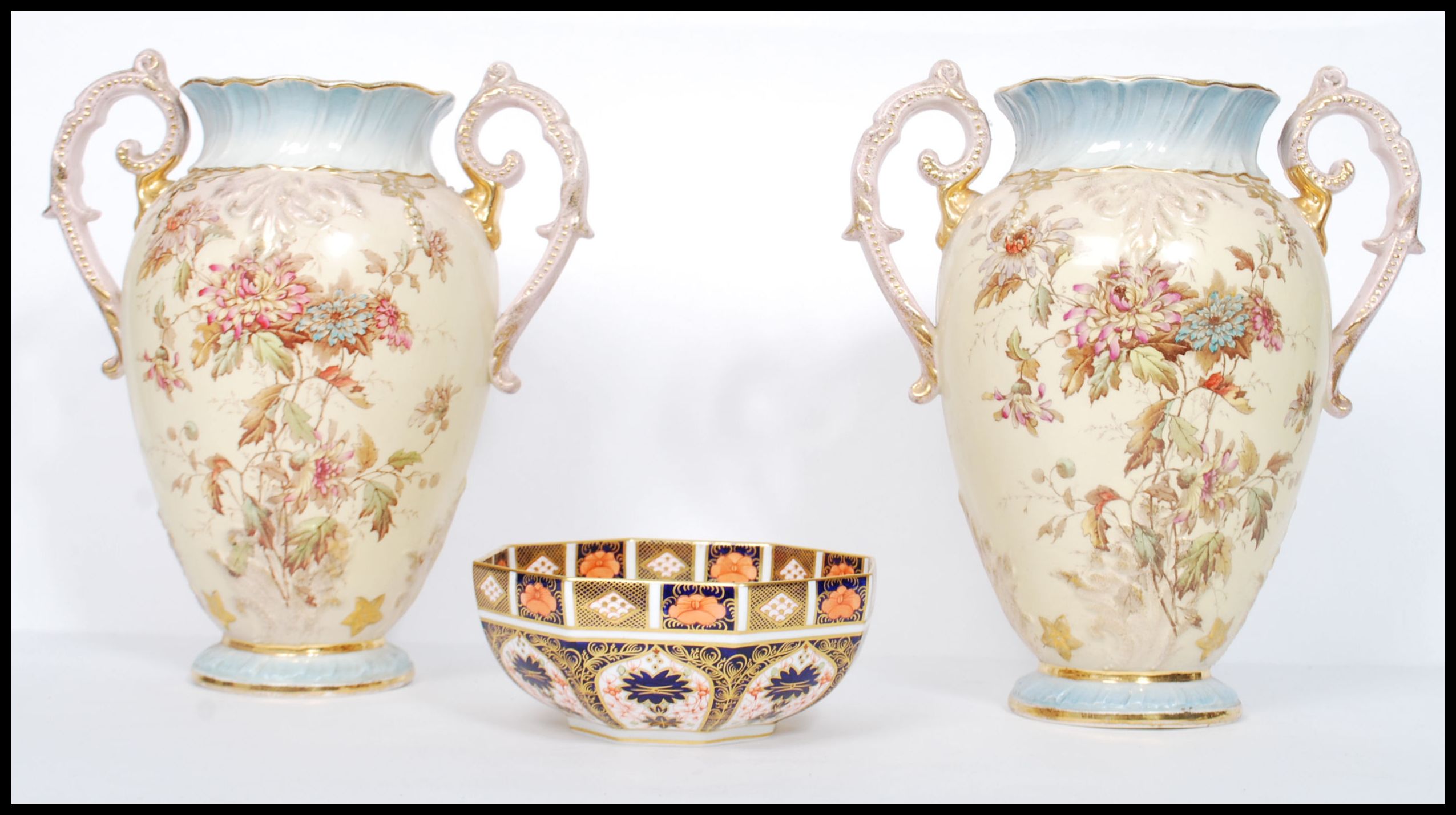 A large pair of Victorian Stafforshire twin handles vases having ivory blush grounds with floral - Image 3 of 7