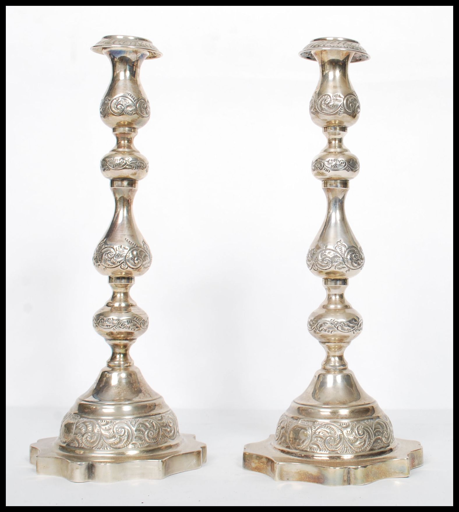 A large pair of Edwardian silver hallmarked London tall candlesticks with shaped terraces and shaped - Image 2 of 7