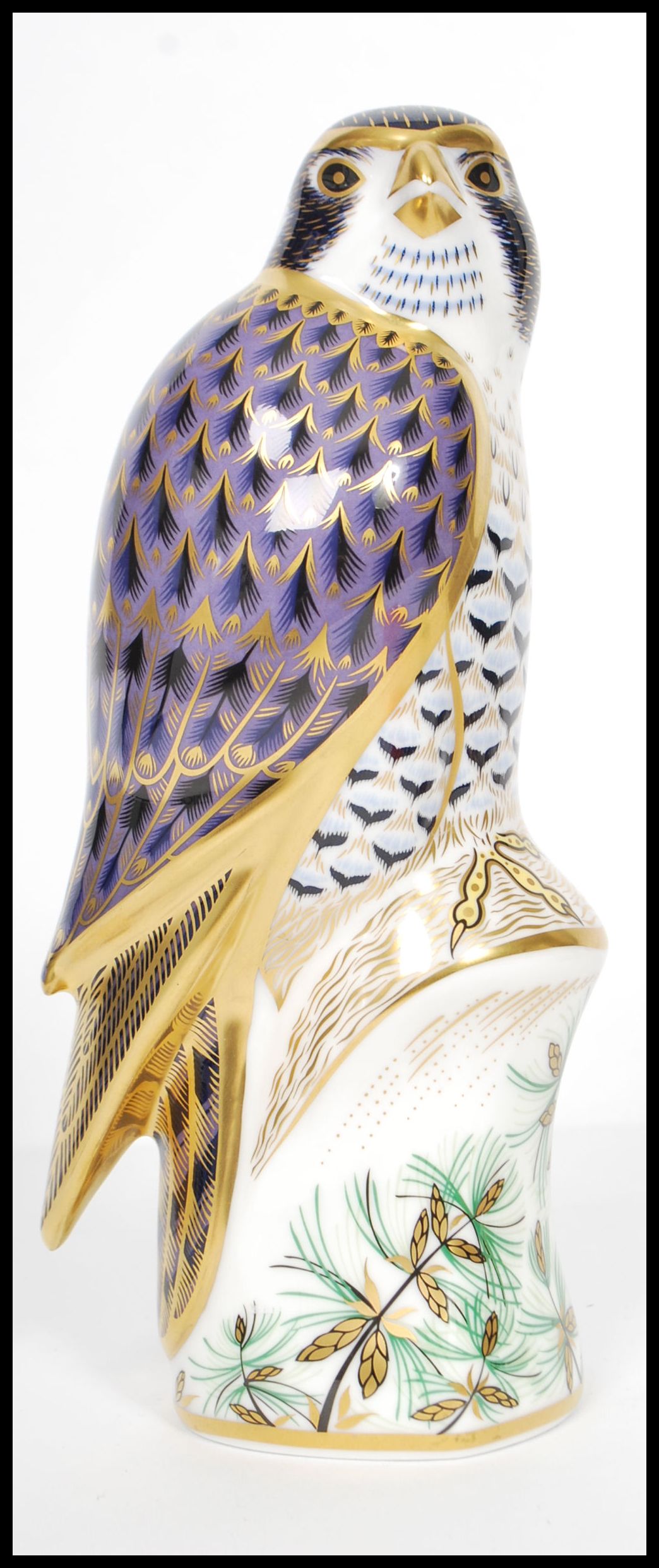 A Royal Crown Derby Peregrine Falcon paperweight, with red stamp to underside, dated 2008 and gold