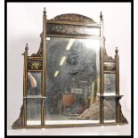 A large 19th century Victorian Aesthetic movement over mantel mirror having an ebonised ground