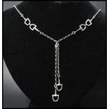 A 925 silver necklace in the style of a watch chain having stirrup links and lobster claw clasp.