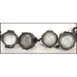 A pair of contemporary PAR Source Four theatre / cinema spot lights complete with the wall mounted