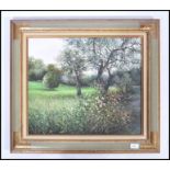 Jean-Claude Cubaynes - An accomplished framed oil on canvas picture, of a orchard meadow scene