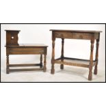 A 20th century Jacobean revival side / occasional table together with a similar style telephone