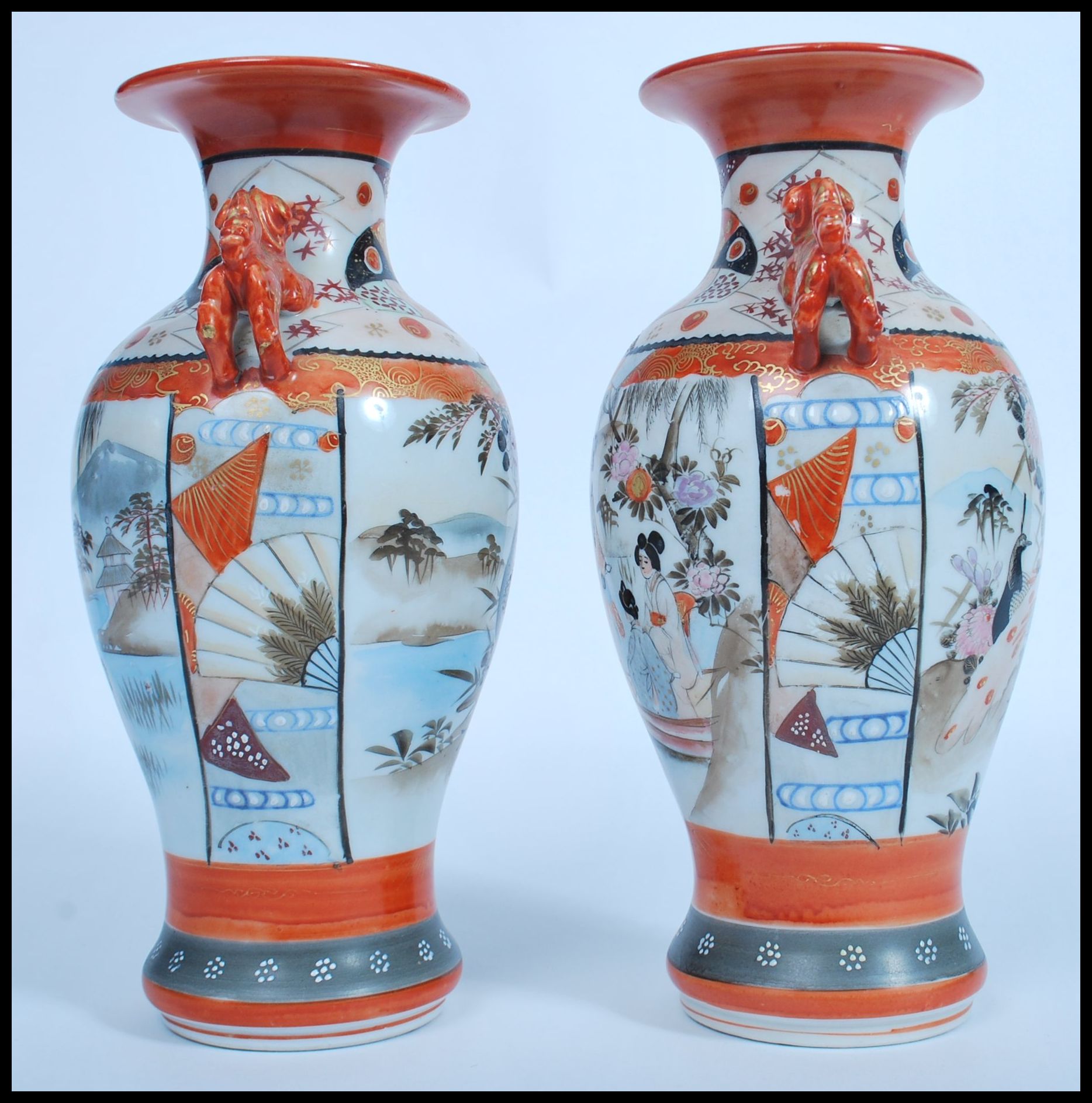 A pair of Japanese Kutani vases, Meiji, with twin handles modelled as dogs of fo, the panels - Image 4 of 6