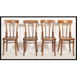 A set of four bent wood dining / bistro / cafe chairs in the manner of Thonet, railed backs