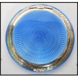 A stunning silver and enamel compact marked Peri 595, London assay marks, dating to 1929, makers