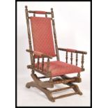 A Victorian mahogany aesthetic movement Boston Rocker - American Rocking chair. Raised on sleigh