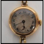 A hallmarked 18ct gold vintage 20th century cocktail watch set to an 18ct gold stamped expanding
