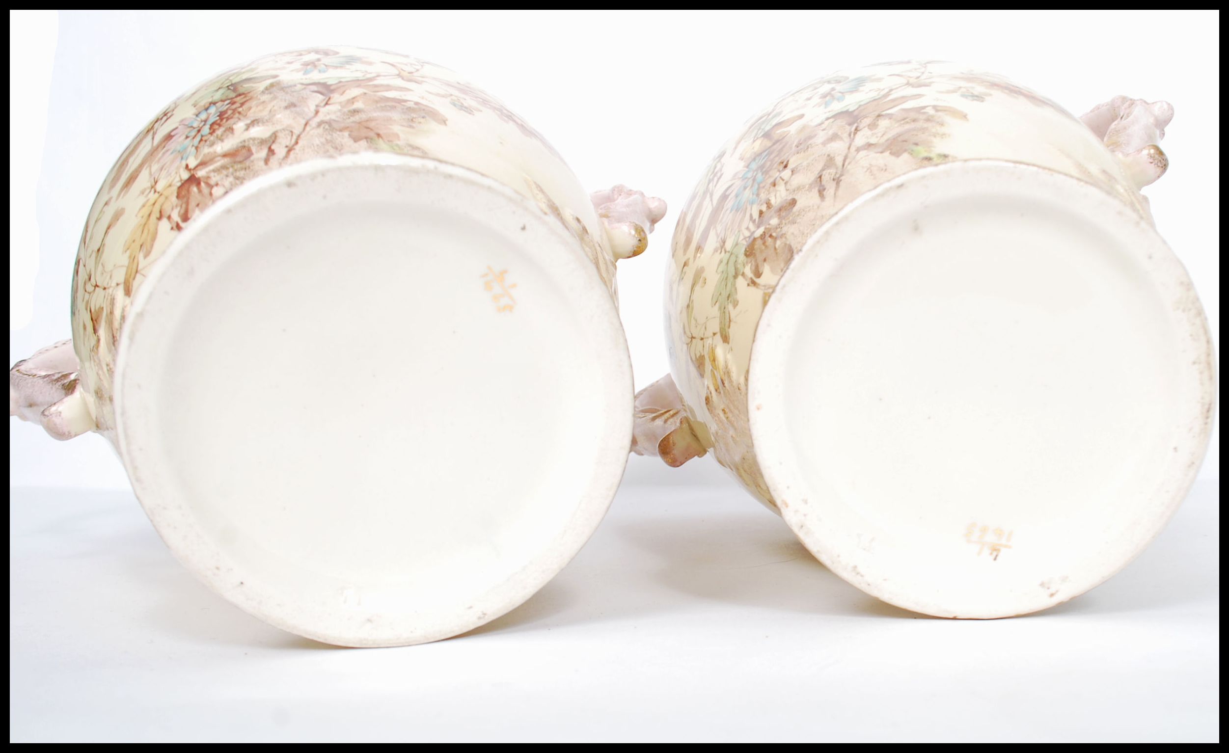 A large pair of Victorian Stafforshire twin handles vases having ivory blush grounds with floral - Image 6 of 7