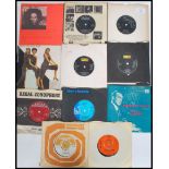 Vinyl Records - A collection of 7" 45rpm vinyl singles dating from the 1960s featuring many
