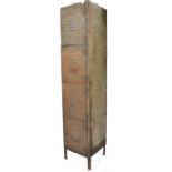 A vintage mid century Industrial upright pedestal locker having a series of 4 drawers running