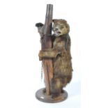 A late 19th / early 20th century Victorian taxidermy example of a dancing bear cub. Retaining