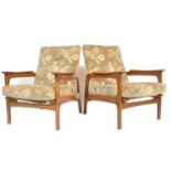 A good pair of mid century armchairs in the manner of Eric Pamphilon and George Fejer for Guy