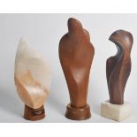 A collection of mid century scupltures by Jan Orpen sculptures in teak and alabaster. Each on