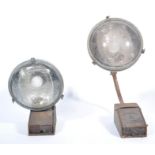 An exceptional pair of early 20th century French Industrial large wall mounted street lights from