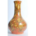 A vintage mid 20th century fat lava baluster vase of bulbous form having a waisted neck with