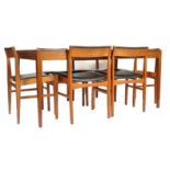 A stunning mid century large Danish extending dining table and set of 6 dining chairs. The large